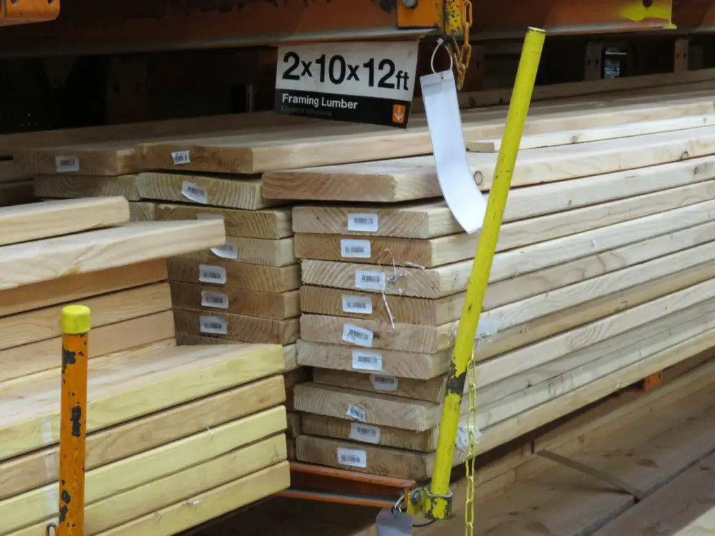 A stack of 2x10 boards. This is dimensional lumber. Weight for each board is about 39 lbs.