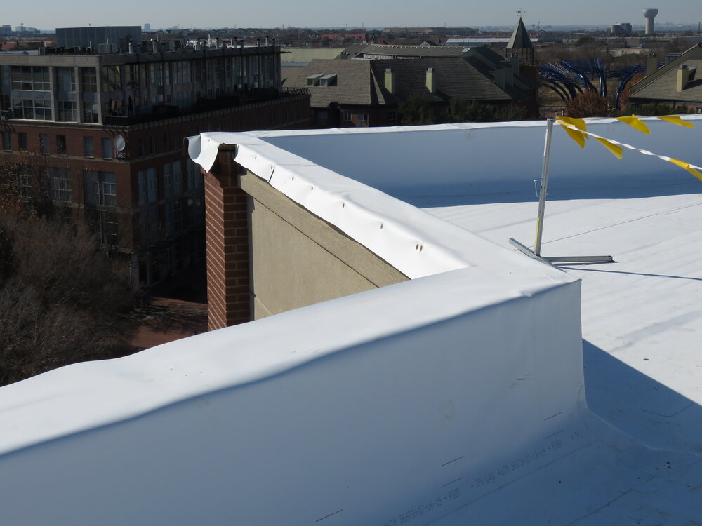 A TPO single-ply roof membrane during installation.