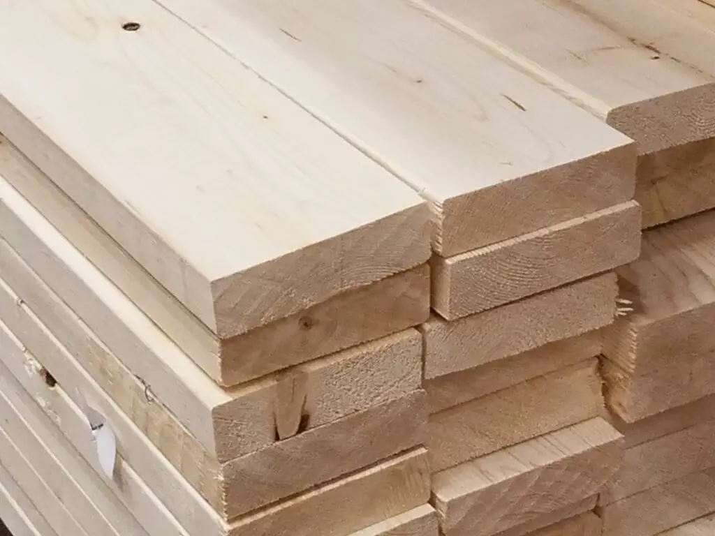 A stack of spruce 2x6 lumber. The weight of these boards is about 1.6 pounds per foot.