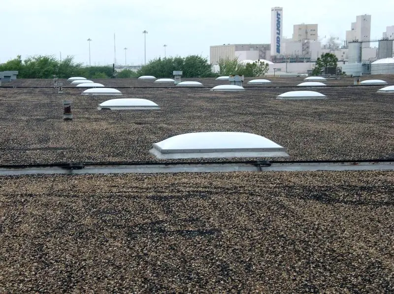 A 25-year-old coal tar pitch built-up roof.