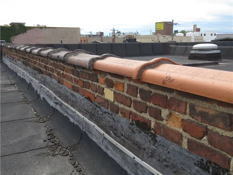 Camelback terra-cotta wall coping is one of the most common types of wall coping used for brick walls.