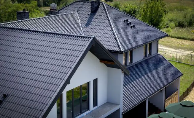 Corrugated fiber cement roof panels