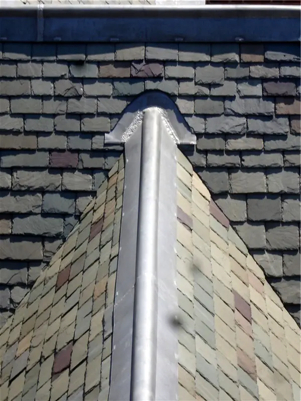 Dormer detail on a slate roof.