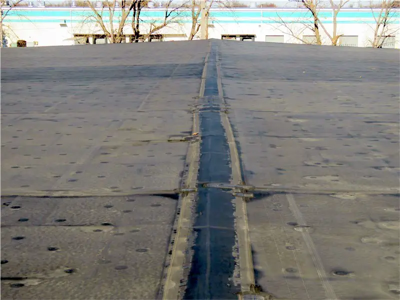 A low-profile expansion joint on an EPDM roof.