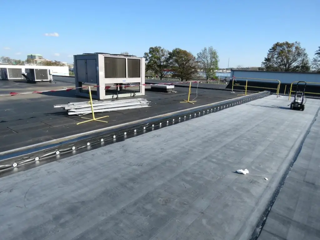 Freshly-installed EPDM membrane during an EPDM roofing project.