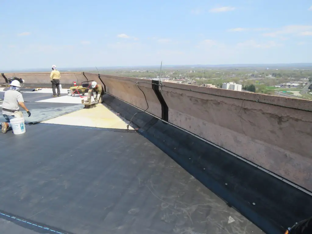 Perimeter work on an EPDM roof.