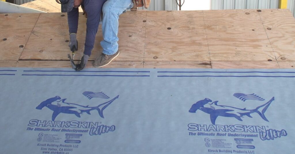 Installing synthetic roof underlayment over plywood roof sheathing