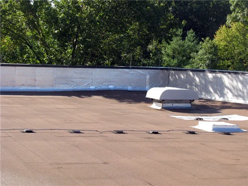 Modified bitumen roof with tan granule surface 1 • Roof Online