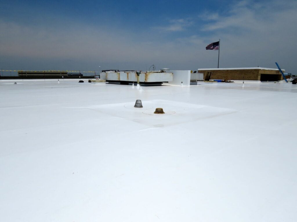 A newly-installed white PVC roof.