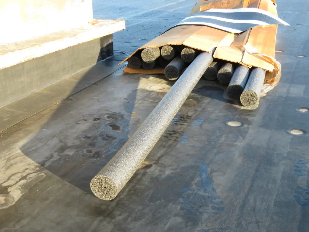 Backer rod sizes: A box of 3-inch closed-cell backer rod lying on an EPDM roof.