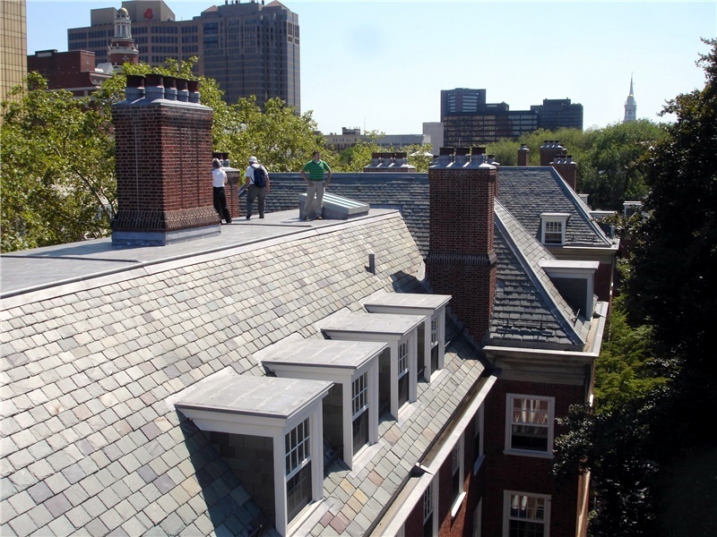 Dormers with lead coated copper roofs on a slate roof