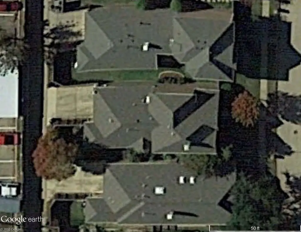 Satellite image of asphalt shingle roofs.