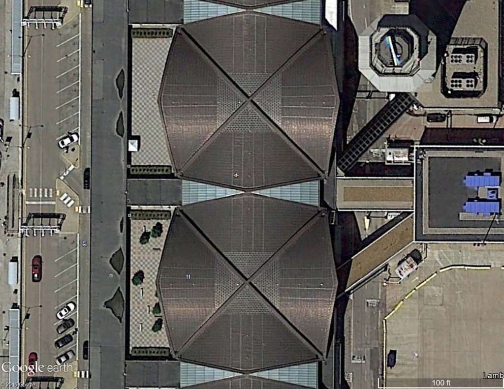 Satellite image of a 5-year-old standing seam copper roofs.