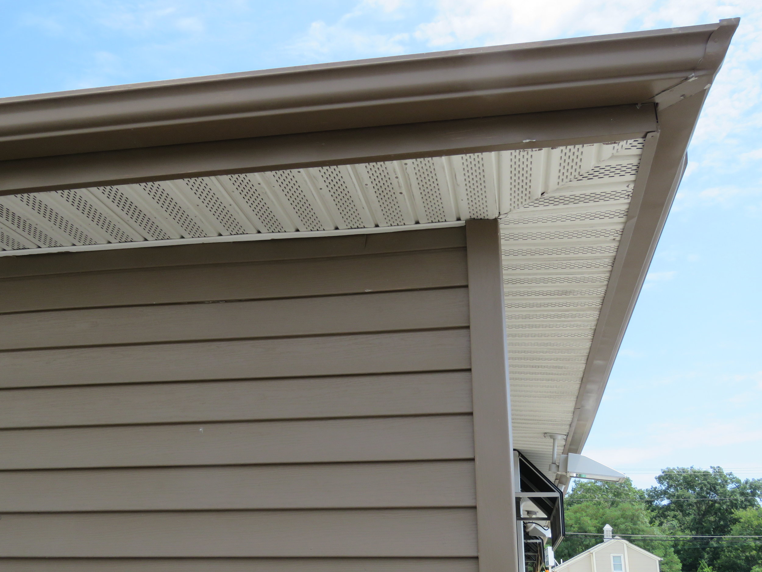 Vented soffit on a house.