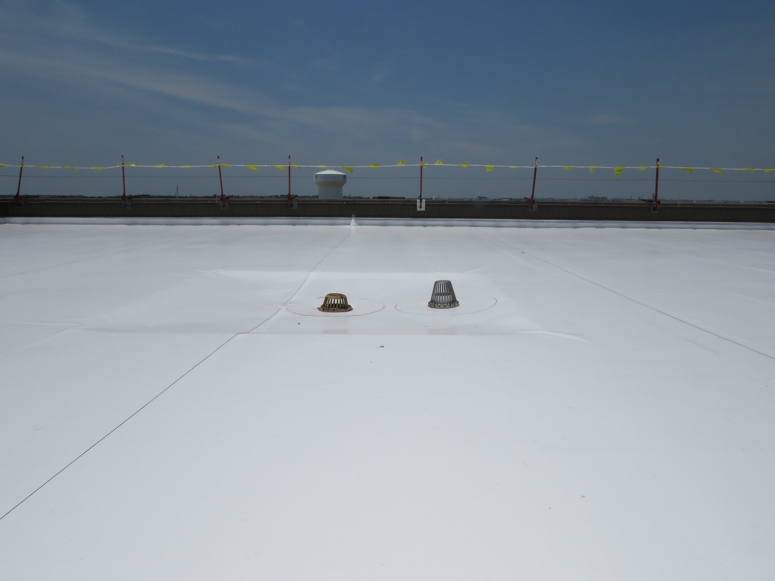 A newly-installed PVC single-ply roof membrane