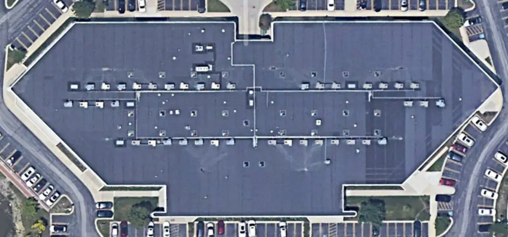 Satellite image of a mechanically-attached EPDM roof. The faint lines that are visible across the entire roof are the membrane seams where the battens are.