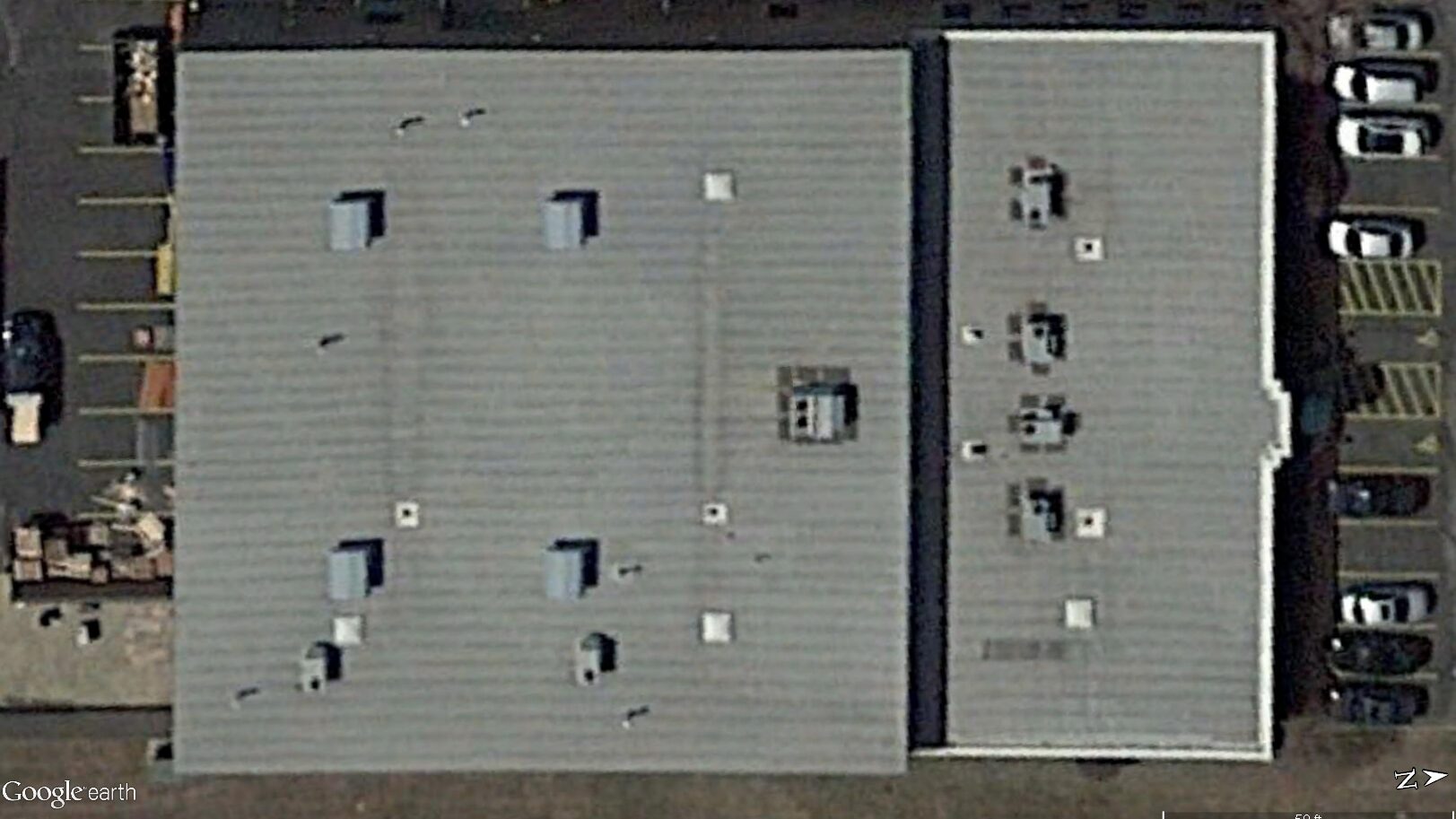 Google Earth satellite image of a modified bitumen roof.