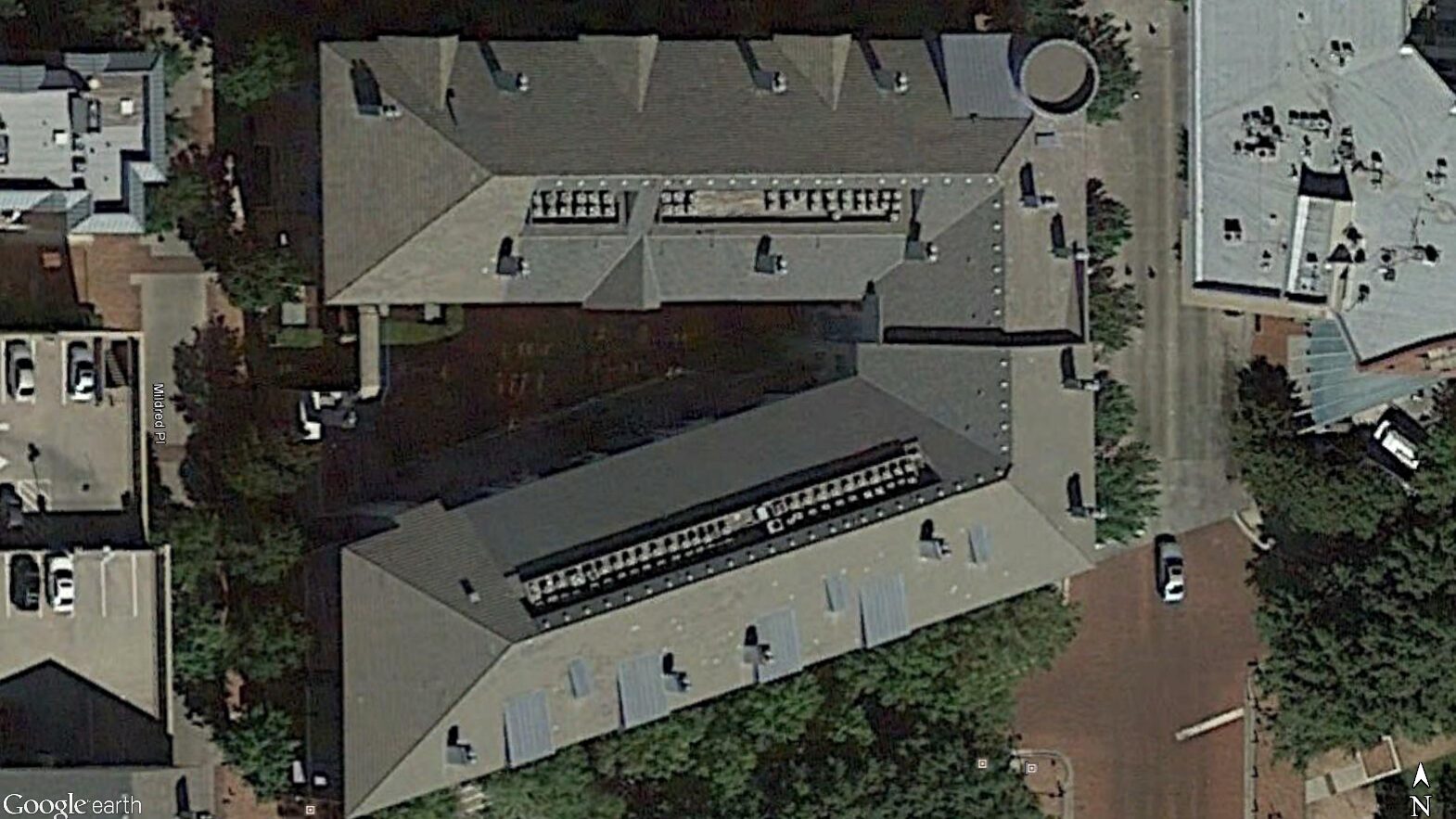 Google Earth satellite image of a flat-profile concrete tile roof.