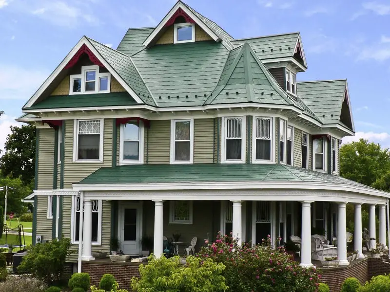 steel roof shingles with green Kynar coating.