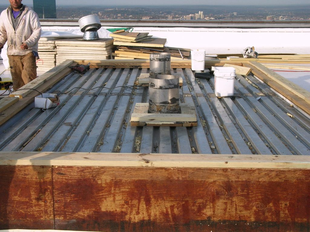 Painted steel roof deck panel.